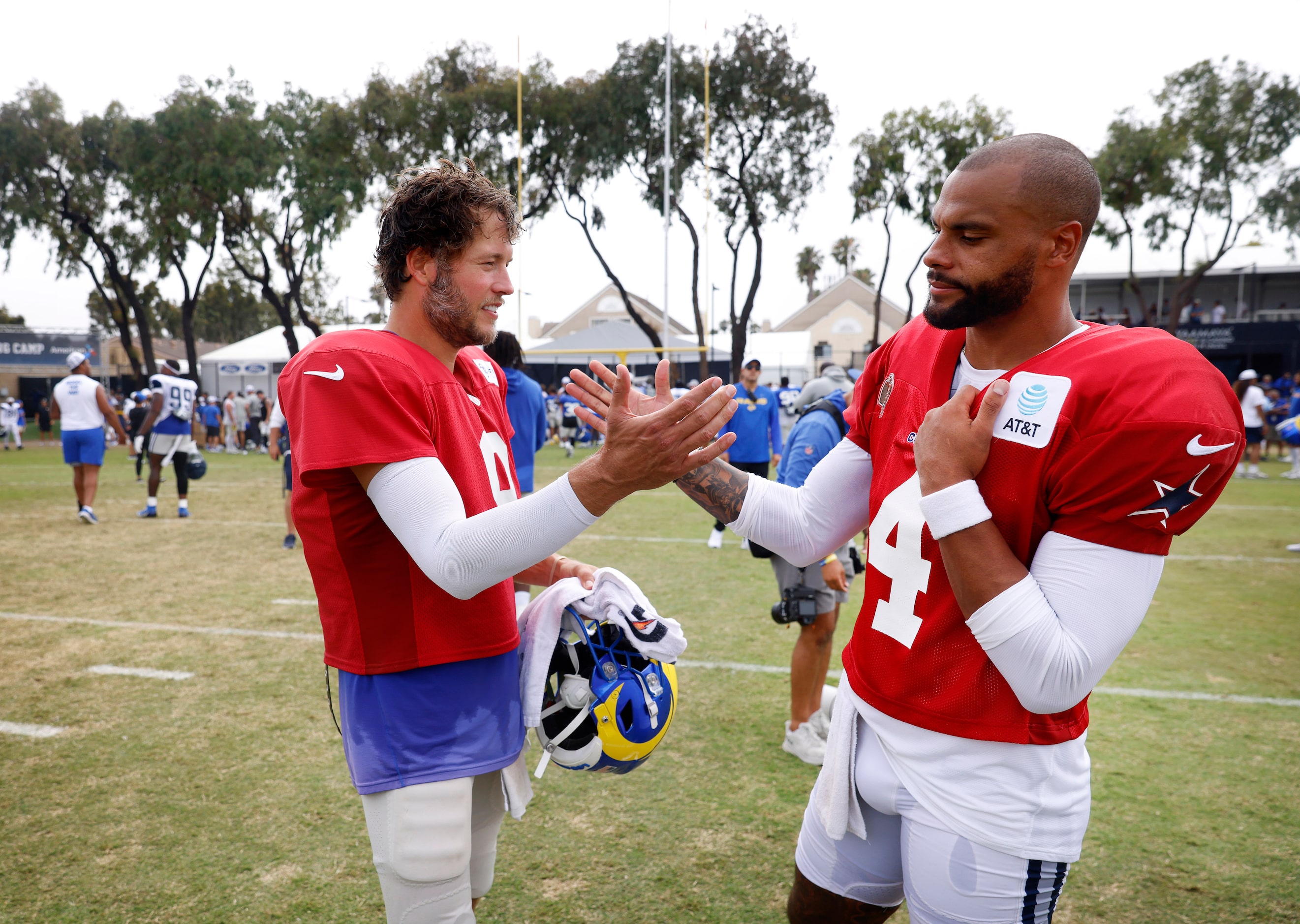 Dallas Cowboys quarterback Dak Prescott (4) and Los Angeles Rams quarterback Matthew...