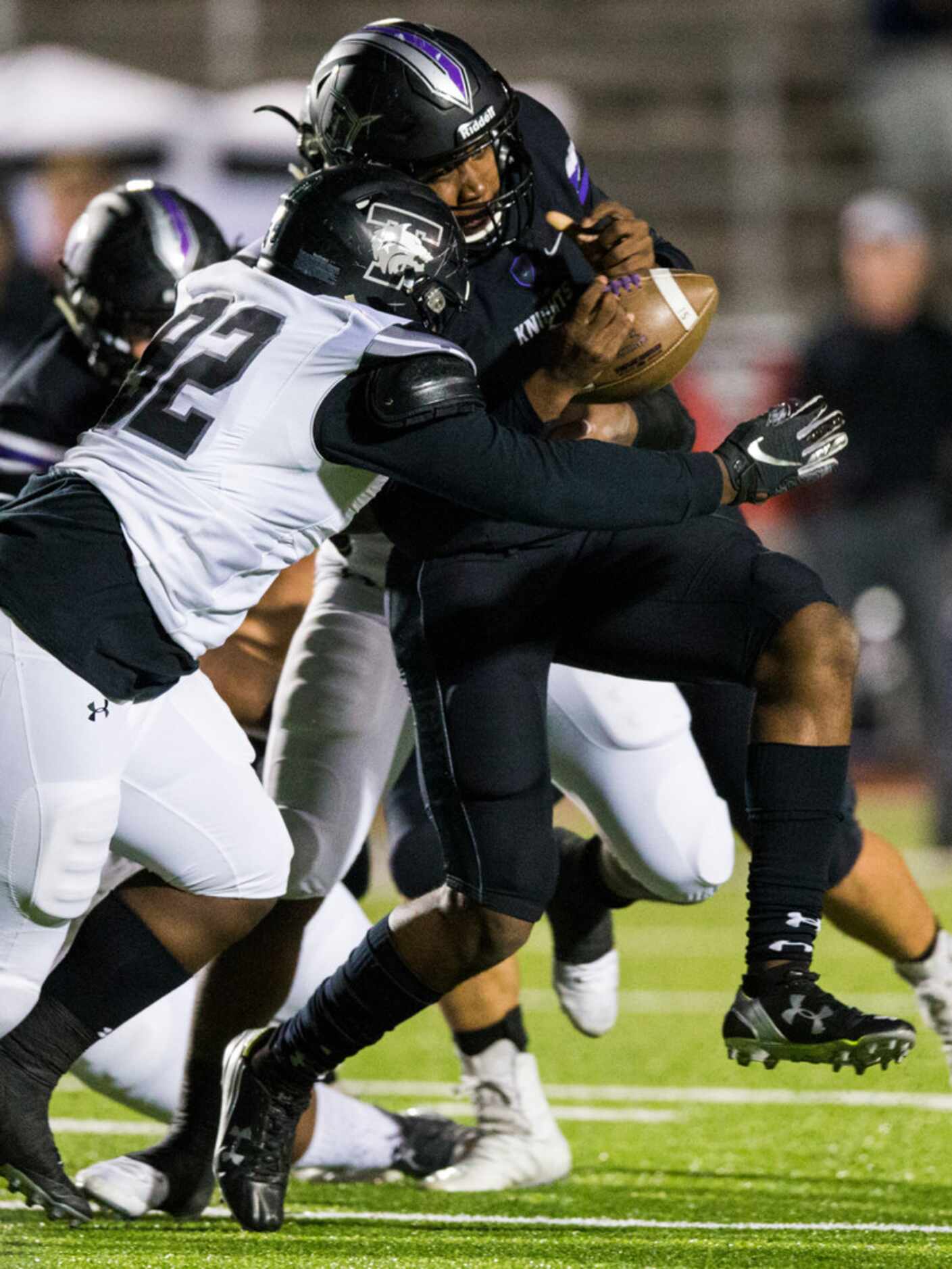 Frisco Independence quarterback Braylon Braxton (1) is tackled by Mansfield Timberview...