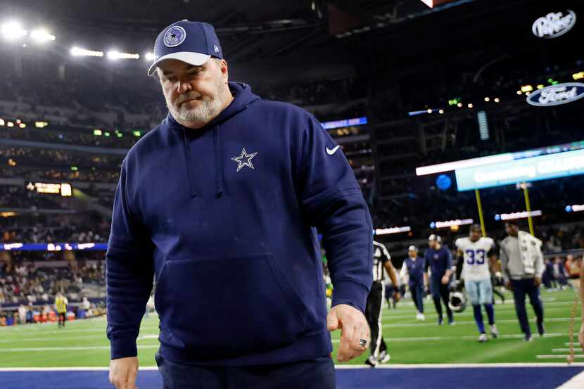 Dallas Cowboys head coach Mike McCarthy leaves the field following their Wild Card Playoff...