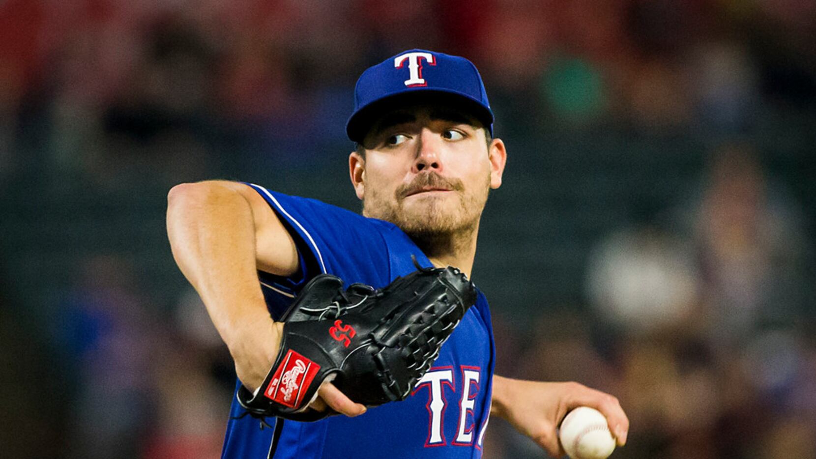 Texas Rangers starting pitcher Matt Moore pitches during the third inning against the...