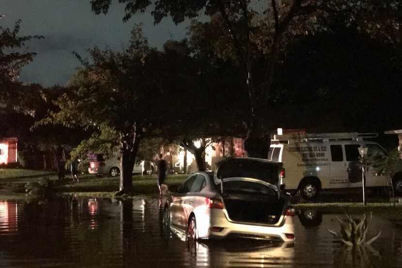 Heavy rains flooded streets overnight Saturday in Everman, a Fort Worth suburb.