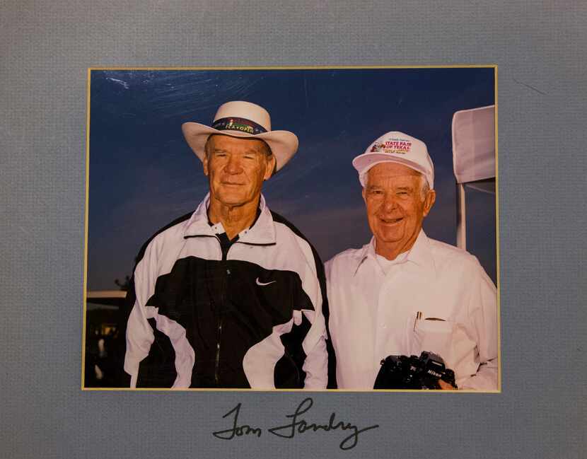 Dallas Cowboys coach Tom Landry and team photographer Brad Bradley. (Courtesy of Brad Bradley)