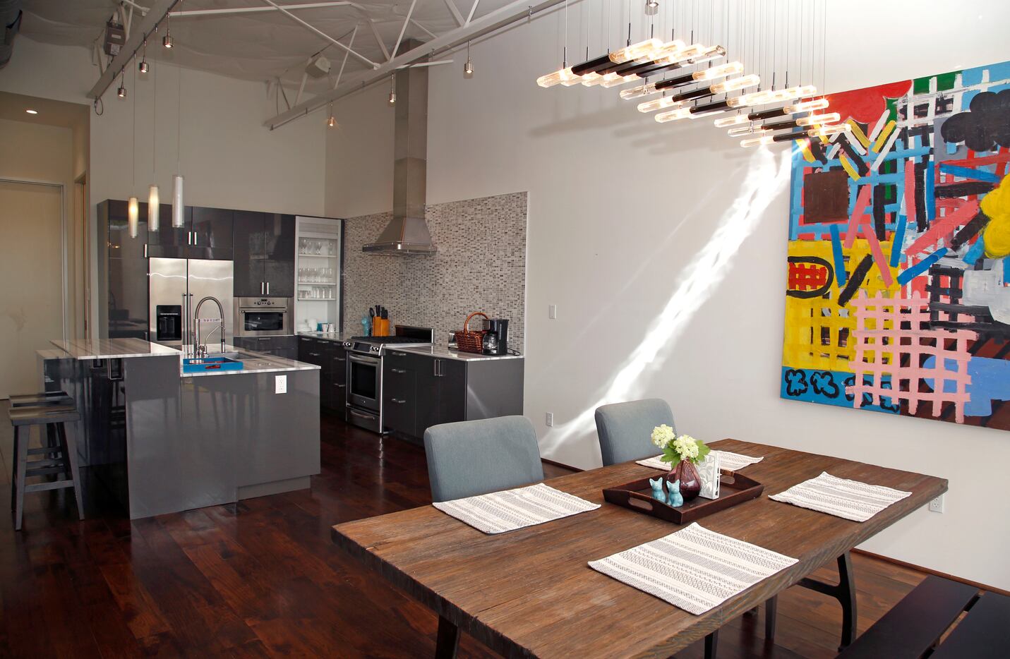 The kitchen and dining area in one of the Vantage Street loft homes in Dallas' Design District.