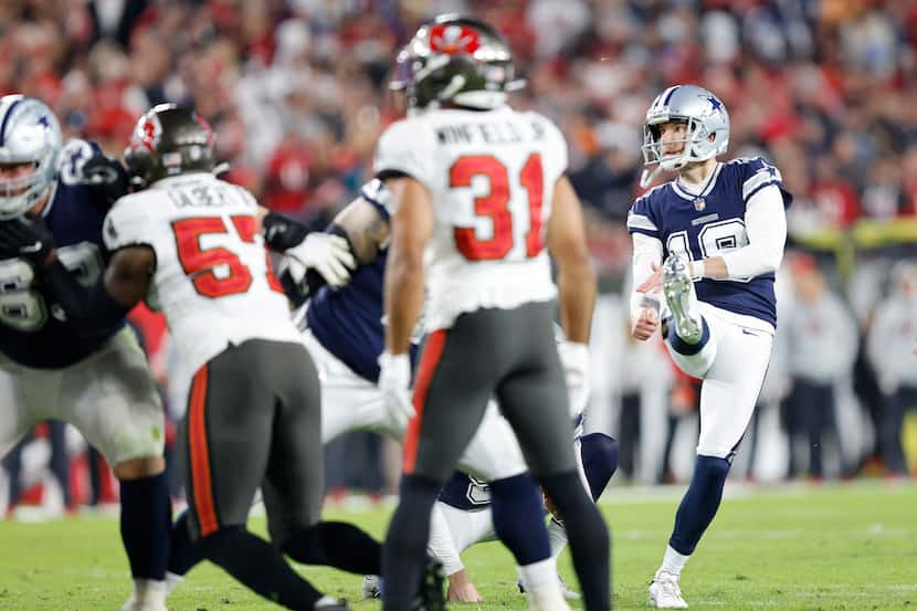 Dallas Cowboys place kicker Brett Maher (19) watches a first half extra point attempt...