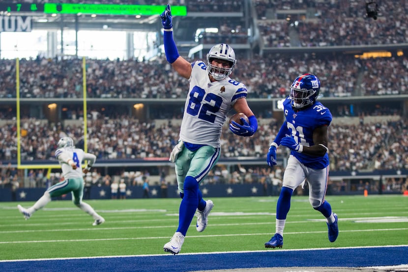 Dallas Cowboys tight end Jason Witten (82) celebrates as he runs to the end zone for a...