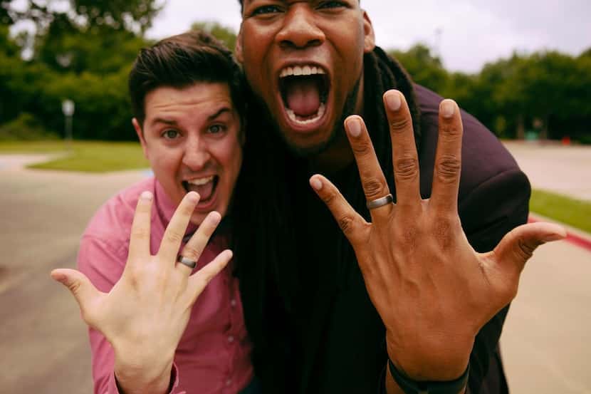 Stuart Hausmann, left, and DeAndre Upshaw got engaged in 2016. Upshaw set it up and...