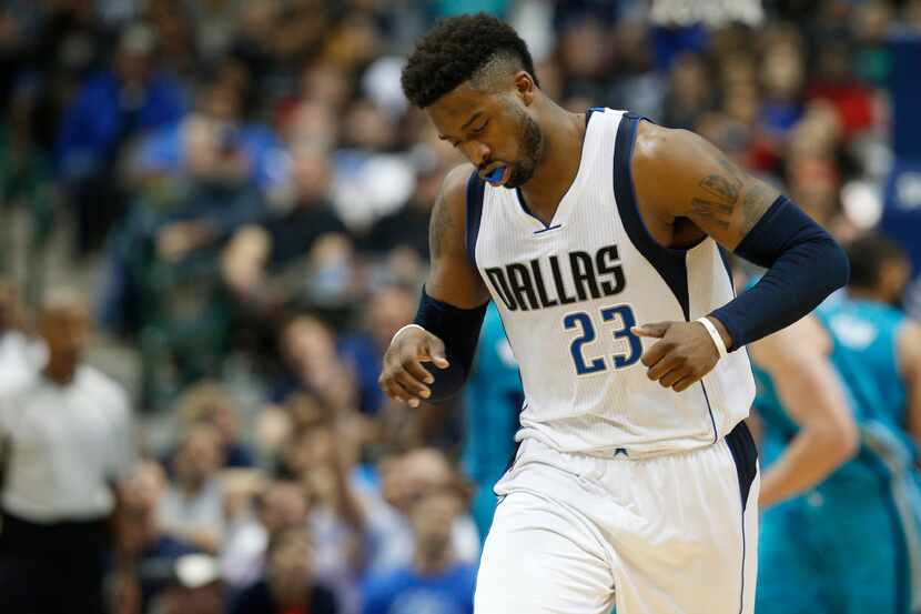 Dallas Mavericks guard Wesley Matthews (23) reacts after a missed shot against Charlotte...