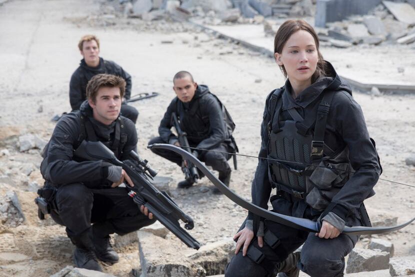  Liam Hemsworth, Sam Claflin, Evan Ross and Jennifer Lawrence plot their next move in "The...