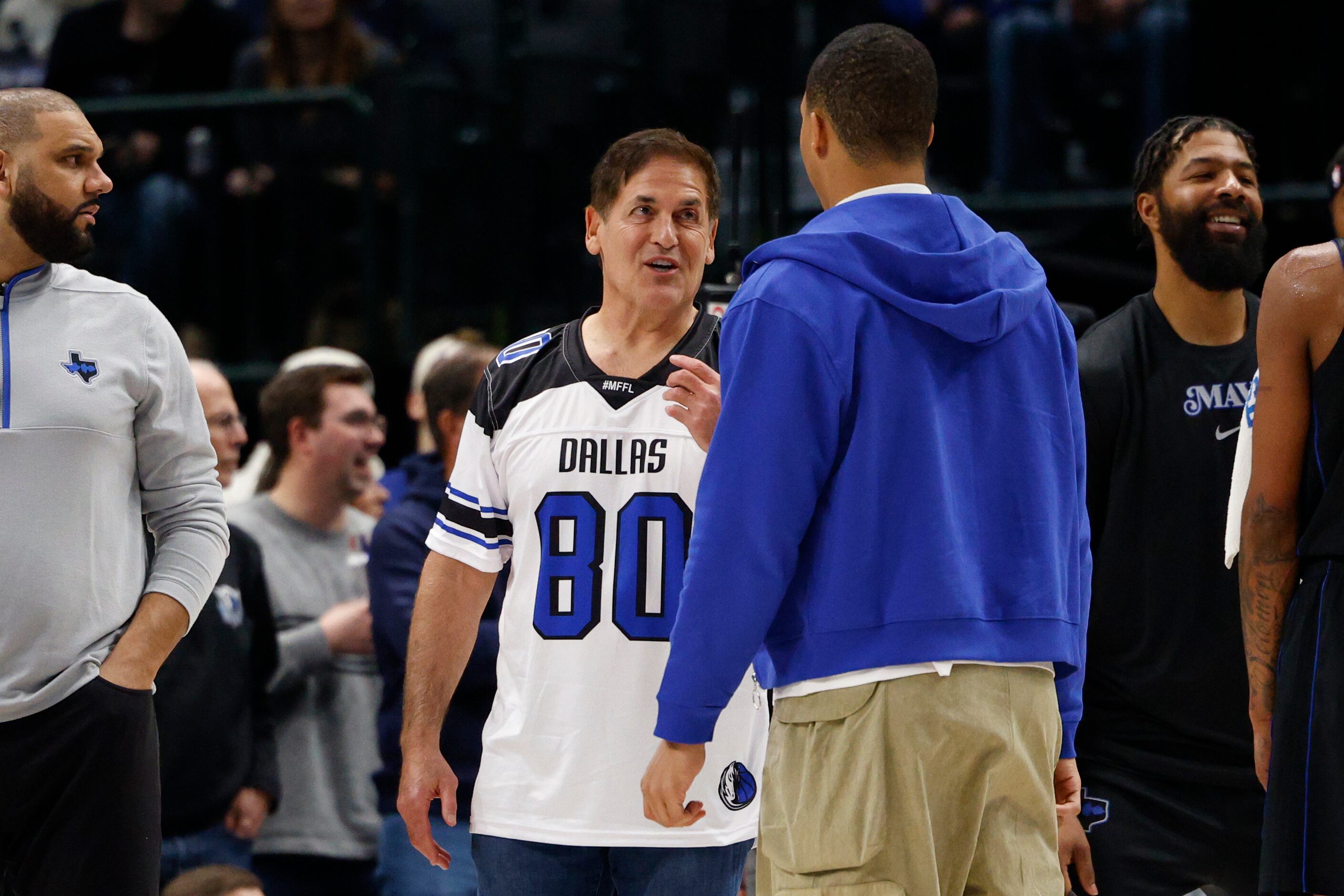 Dallas Mavericks owner Mark Cuban (left) talks with forward Grant Williams during the second...