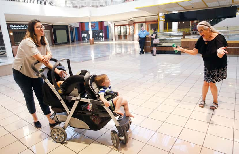 Molly Blonn, who visited Collin Creek Mall Wednesday with her two young sons, and mother,...