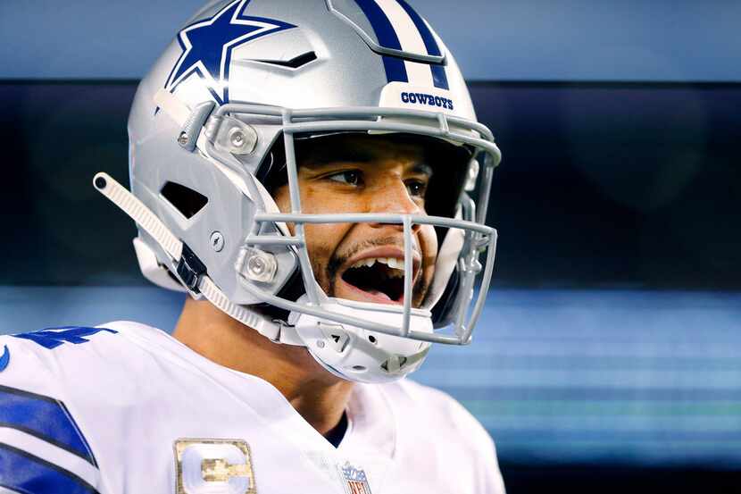 Dallas Cowboys quarterback Dak Prescott (4) is pictured on the sideline before the...