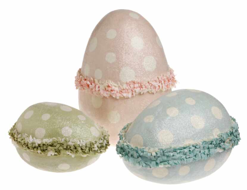 Papier-mache eggs in a rainbow of pastel colors stand alone or nest within each other to...
