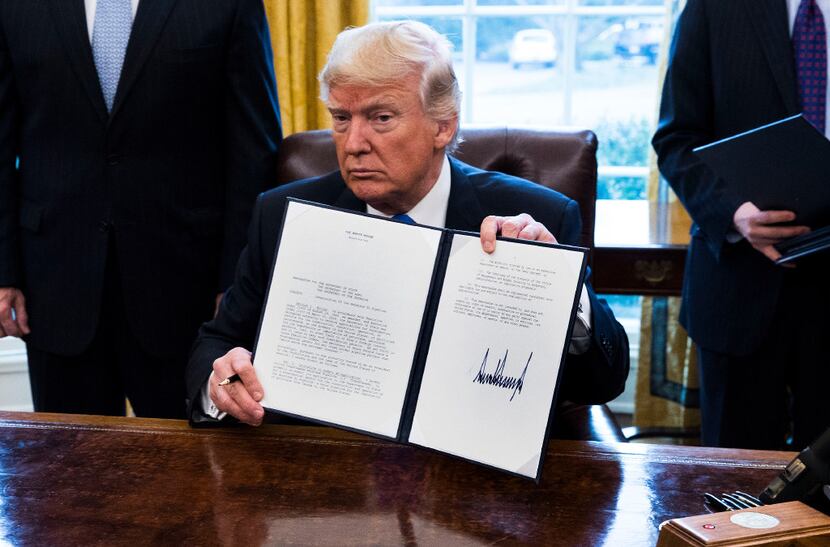 President Donald Trump signs an executive order in January to advance the Dakota Access and...