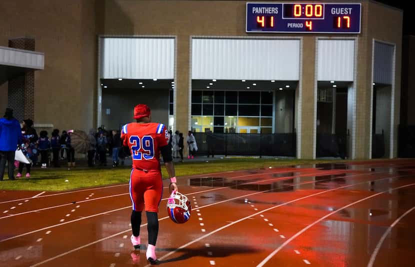 Duncanville running back Caden Durham leaves the field after a victory over DeSoto in a...