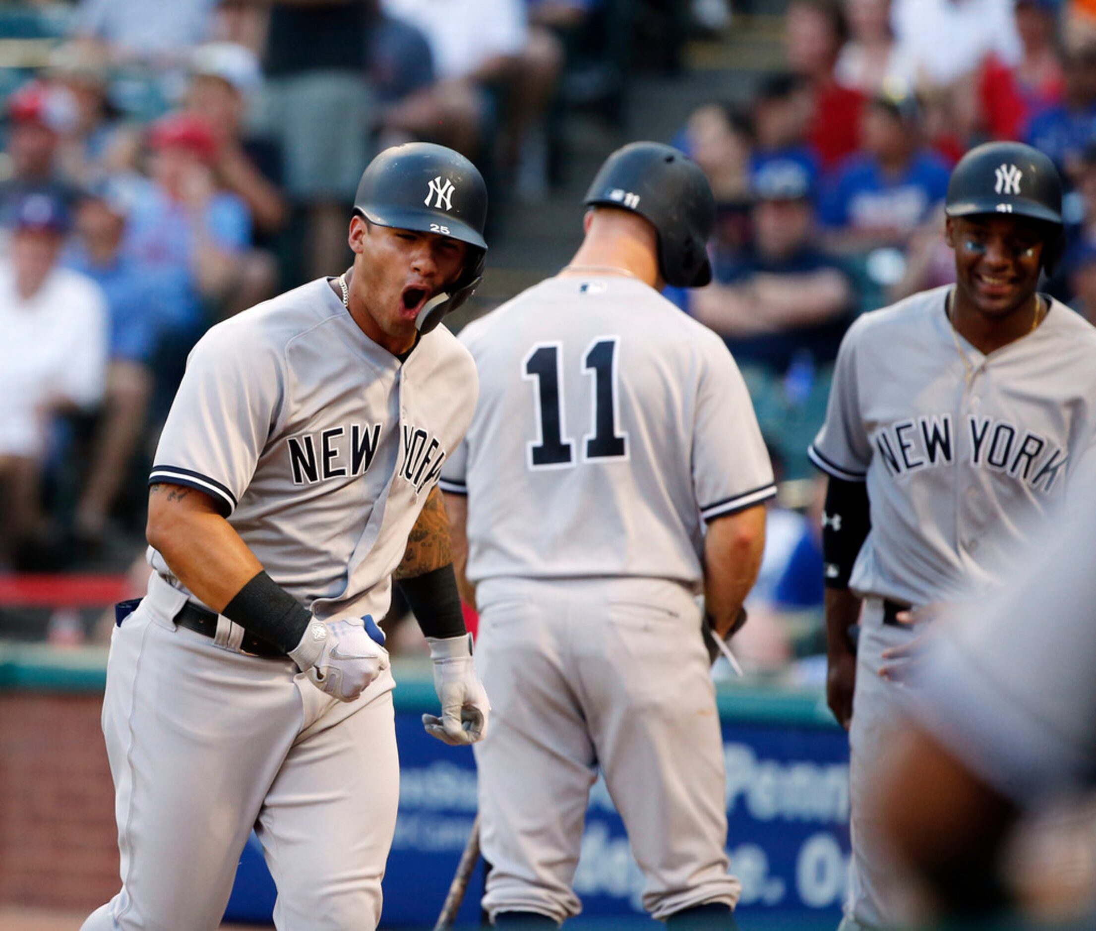 New York Yankees Gleyber Torres (25) celebrates his three-run home run against the Texas...