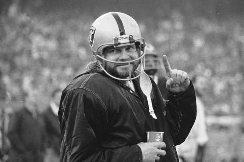 Oakland Raiders quarterback Ken Stabler stands on the sidelines during the second half of...
