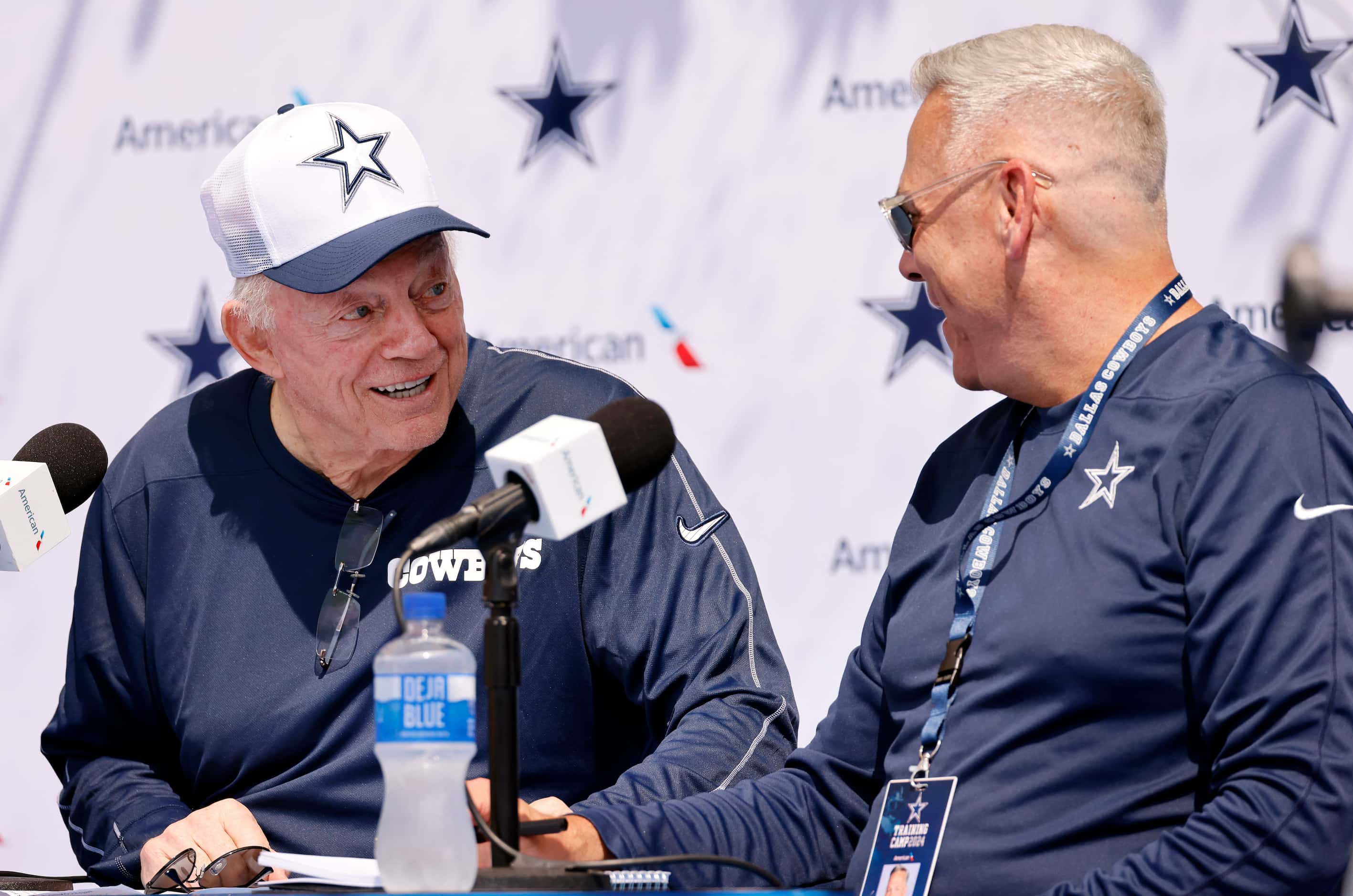 Dallas Cowboys owner Jerry Jones (left) laughs alongside Sr. Vice President of...