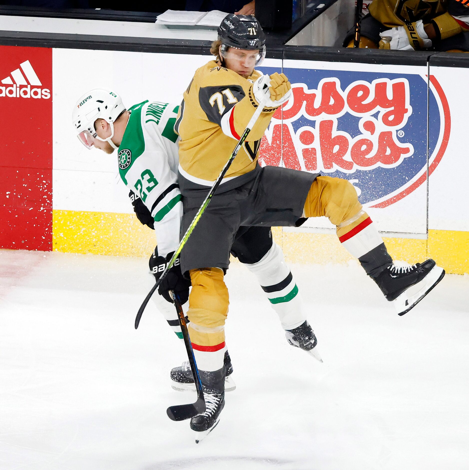 Dallas Stars defenseman Esa Lindell (23) collides with Vegas Golden Knights center William...