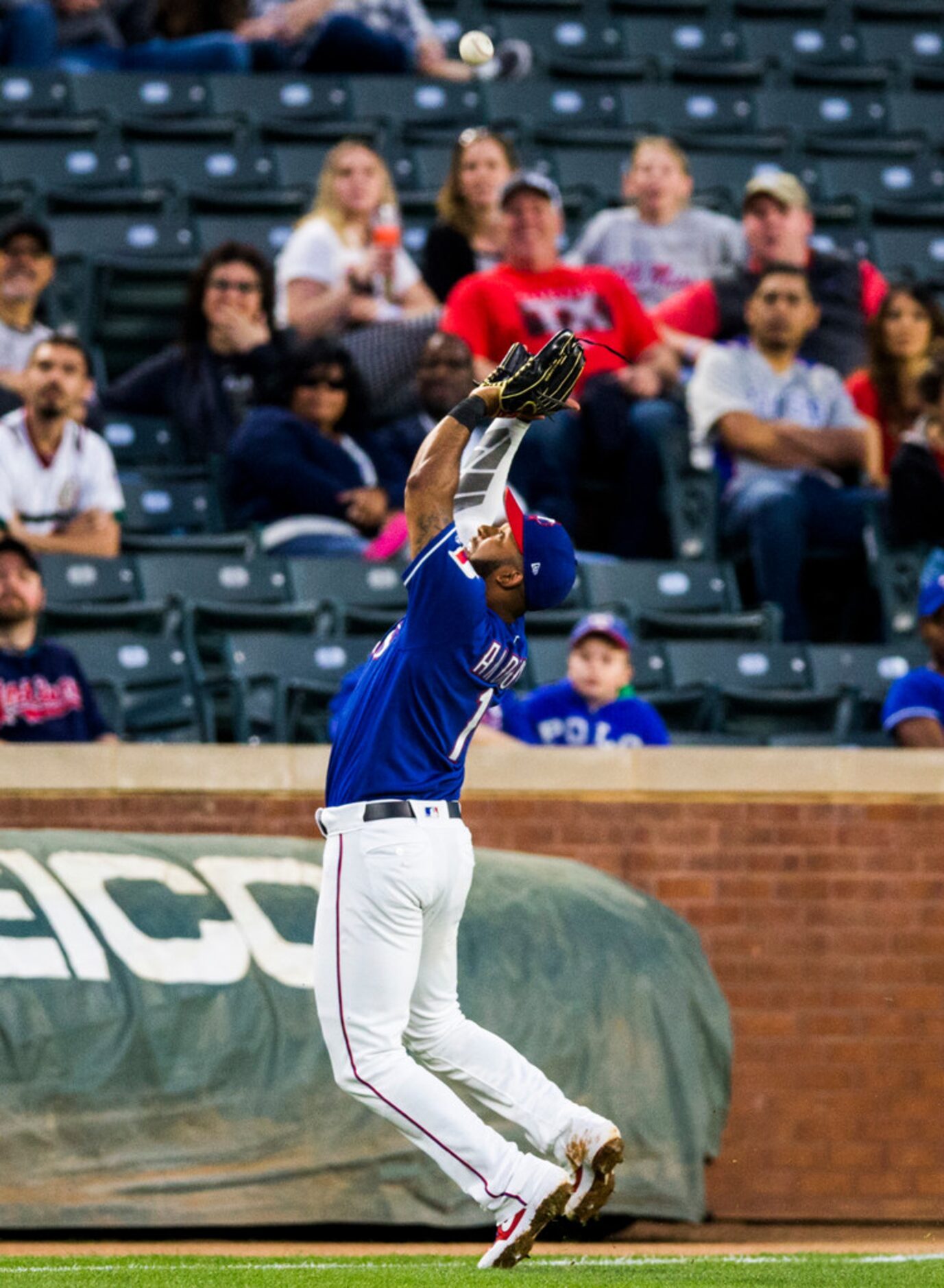 Texas Rangers shortstop Elvis Andrus (1) catches a hit to left field during the third inning...