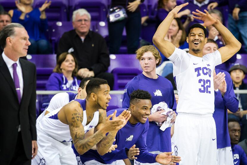 TCU forward Karviar Shepherd (32) celebrates after a Horned Frogs basket during the first...