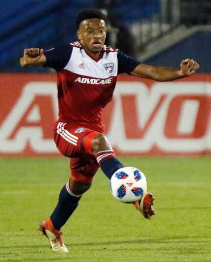 FC Dallas midfielder Jacori Hayes (15) controls the soccer ball during the first half as FC...