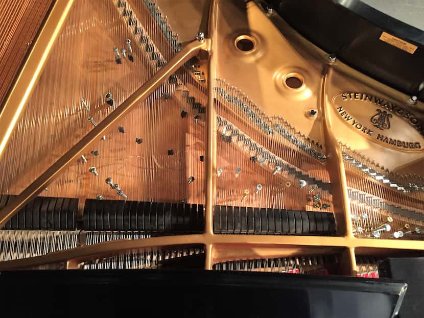 A Steinway grand piano "prepared" for John Cage's "Sonatas and Interludes," at the Nasher...
