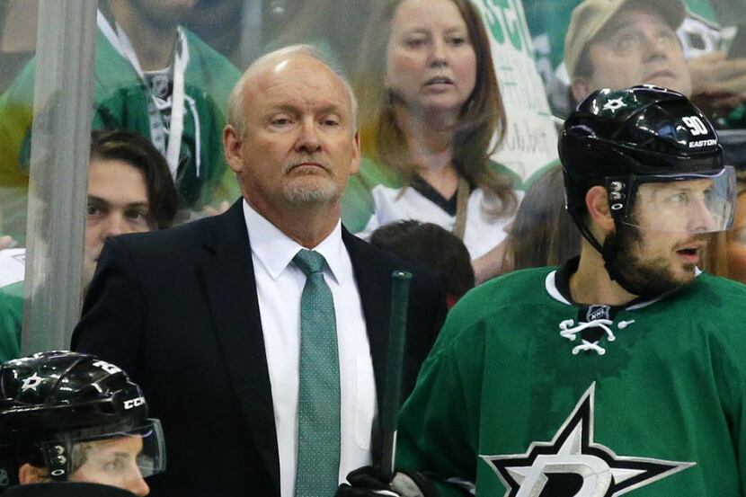 Dallas Stars head coach Lindy Ruff watches his team play the St. Louis Blues in the second...