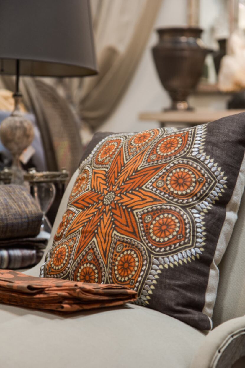 Accessory pillows, such as an offering from Neal Stewart Designs, continue to be a key...