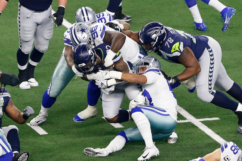 Dallas Cowboys outside linebacker Damien Wilson (57), Dallas Cowboys defensive tackle Maliek...