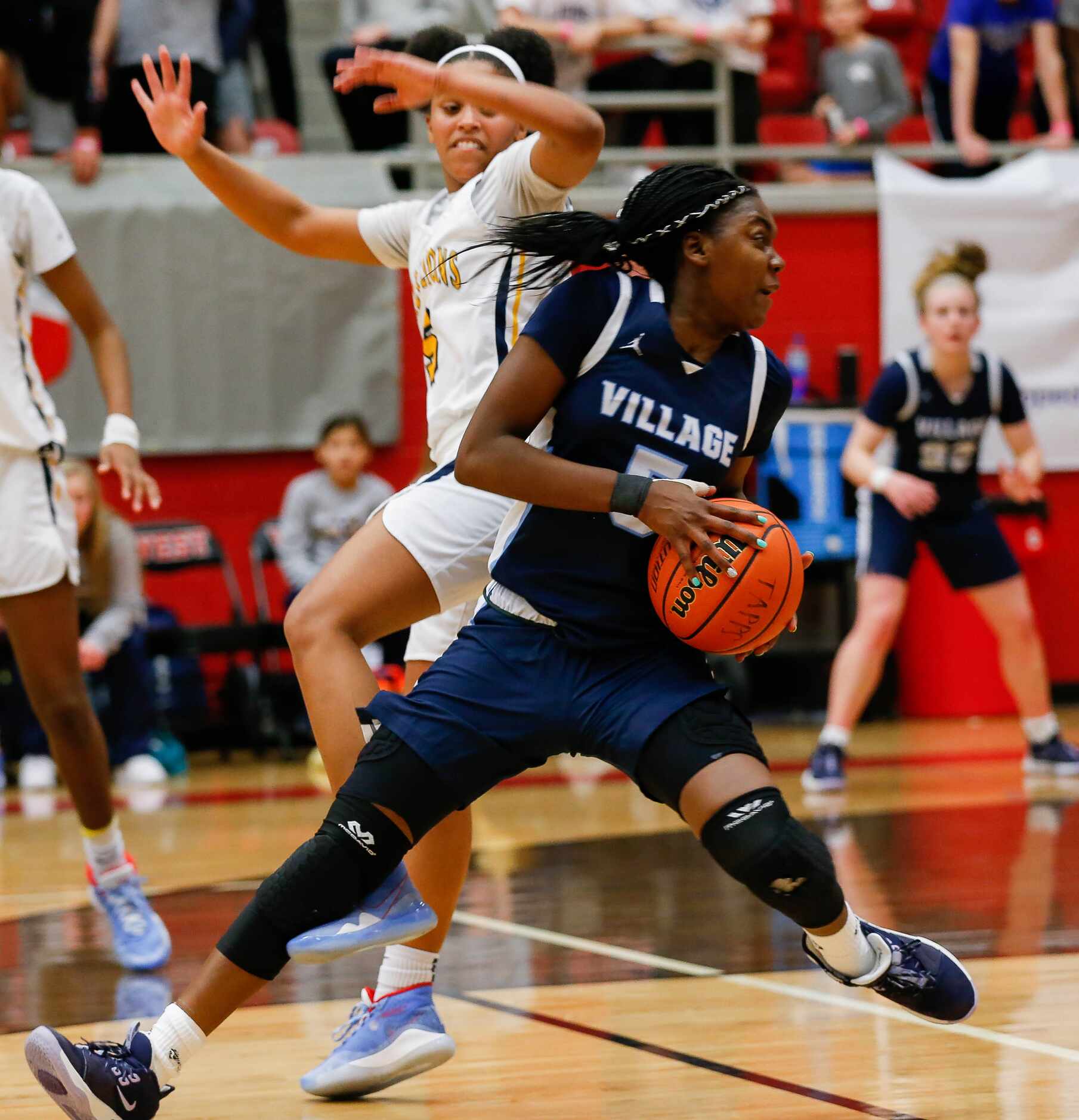The Village School's Tymberlin Criswell (5) drives past Plano Prestonwood Christian's...