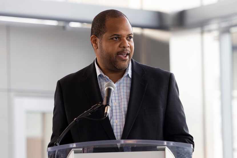 Dallas Mayor Eric Johnson speaks during a press conference at Terminal C in DFW...