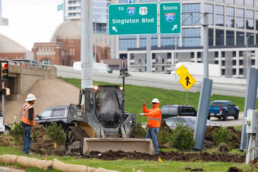 Workers on the Hi Line Connector construction site Friday afternoon.