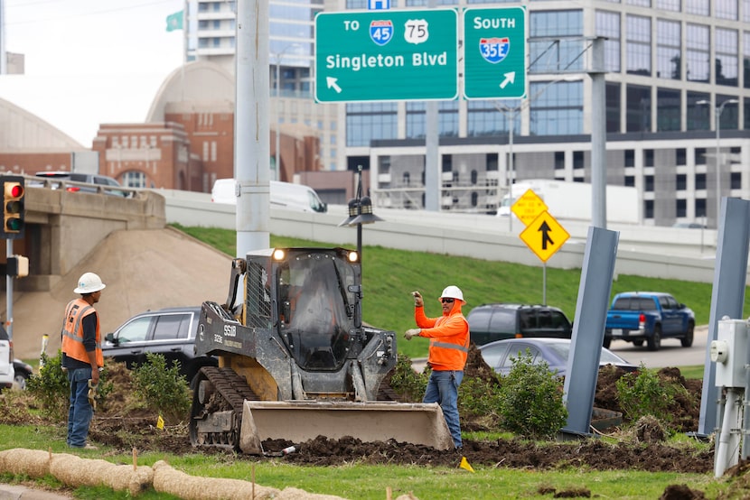 Workers on the Hi Line Connector construction site Friday afternoon.