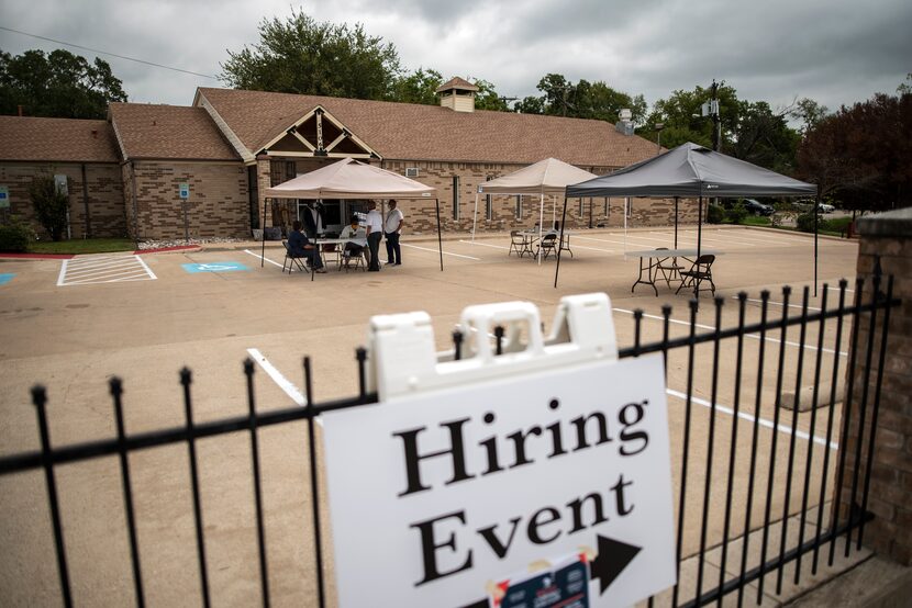 Employees of Workforce Solutions Greater Dallas prep for a virtual job fair hosted by the...