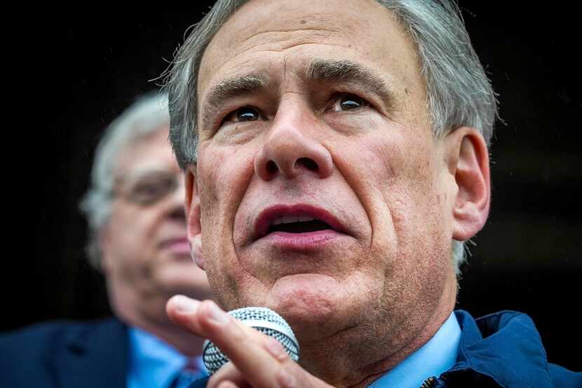 Gov. Greg Abbott speaks on the north steps of the State Capitol to supporters at a Texas...