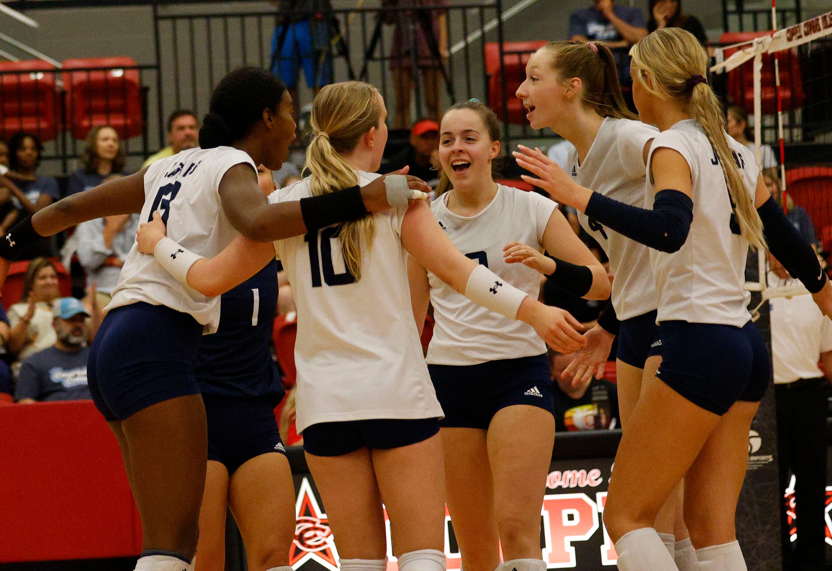 Flower Mound players react during a high school girl’s volleyball match against Coppell,...