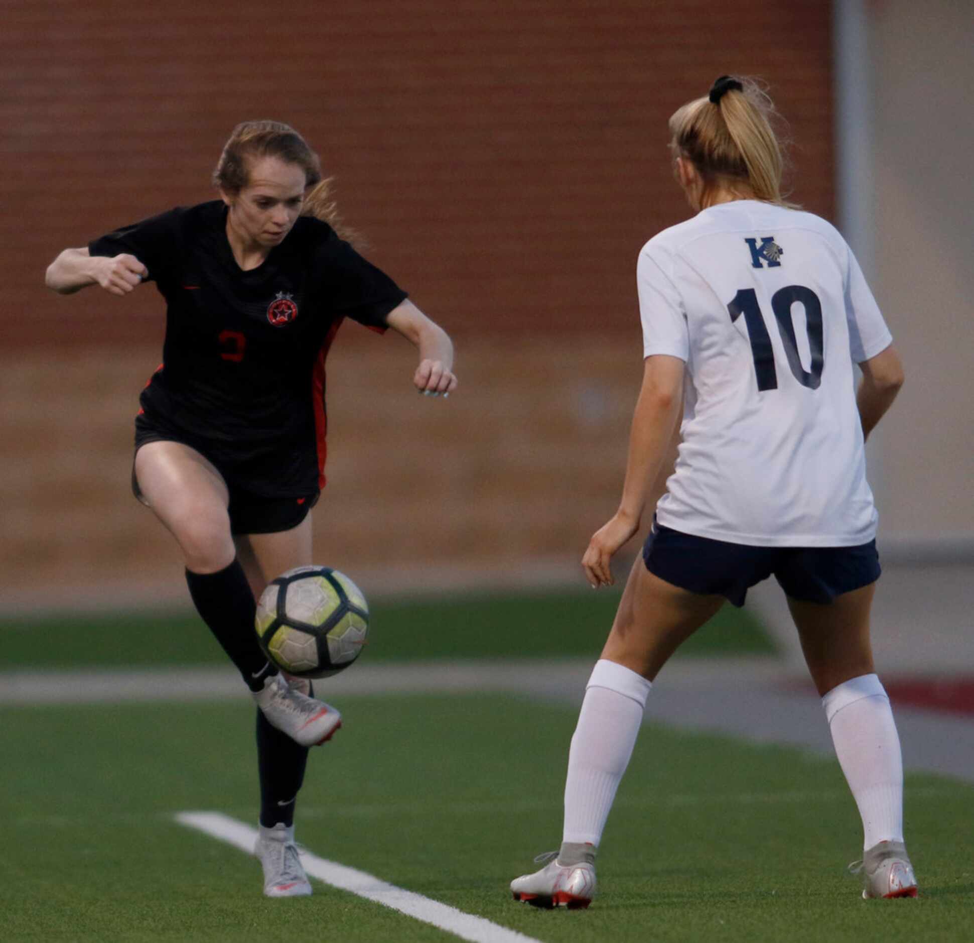 Coppell's Rebecca Watley (9) controls the ball as Keller's Frankie Nine (10) defends during...