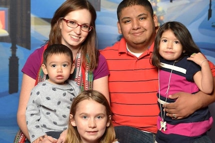 Officer Xavier Serrano, his wife Carolyn, and three children. 