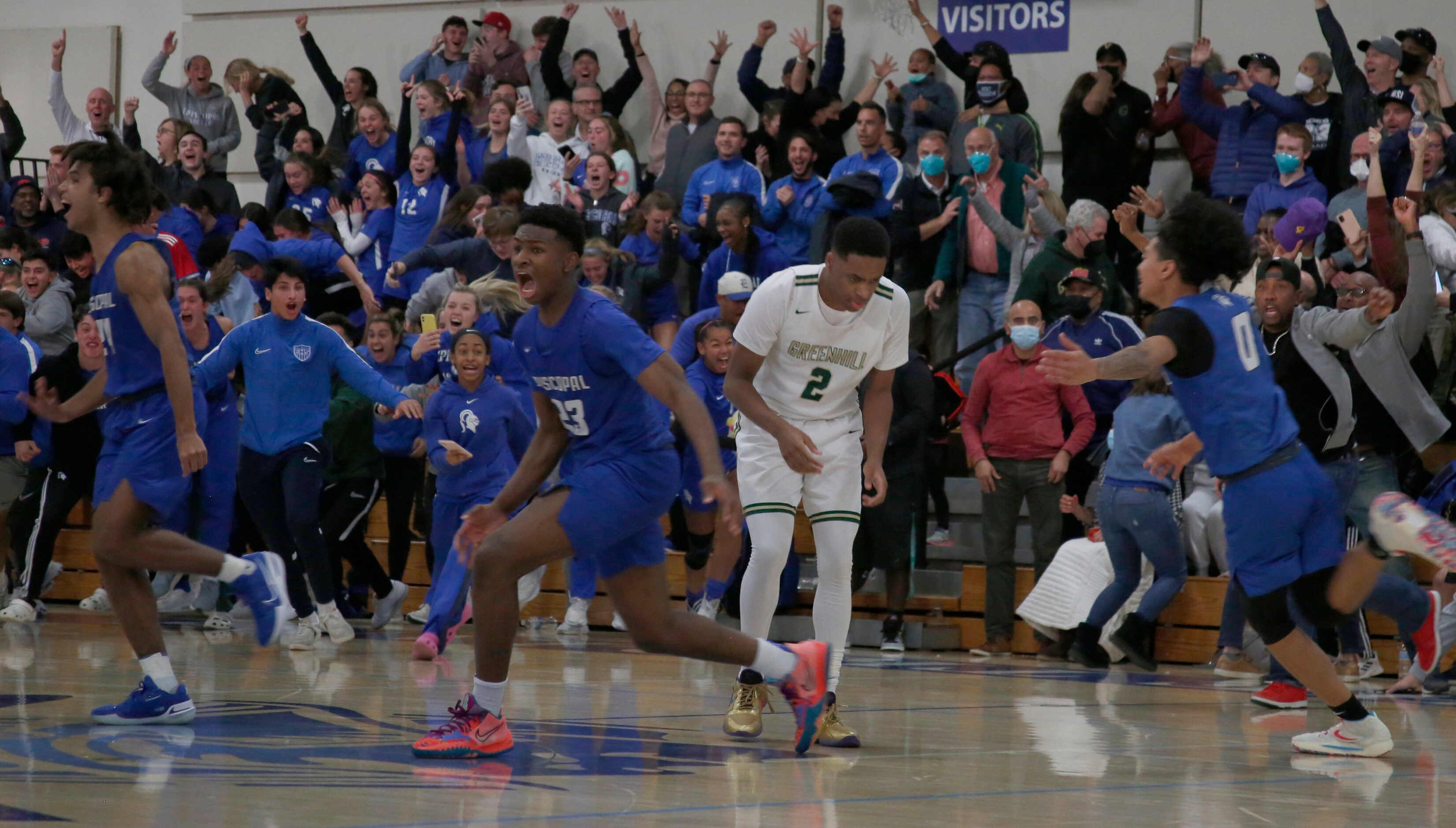 Greenhill's Noah Shelby (2) pauses in disbelief as Houston Episcopal players and fans...