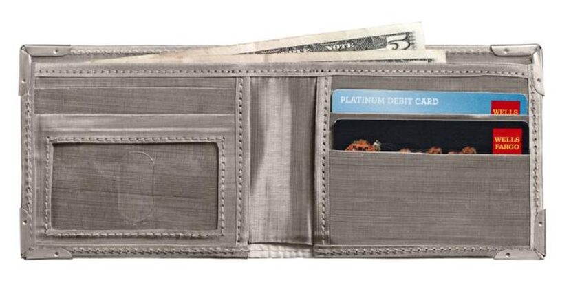 
The woven metal fibers of this stainless steel wallet thwart identity thieves by forming a...