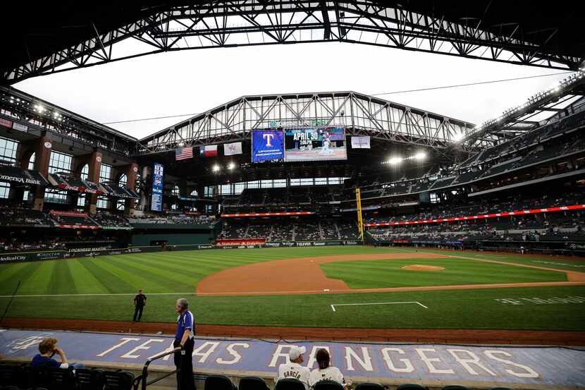 The roof of Globe Life Field opens before a baseball game between Texas Rangers and Houston...