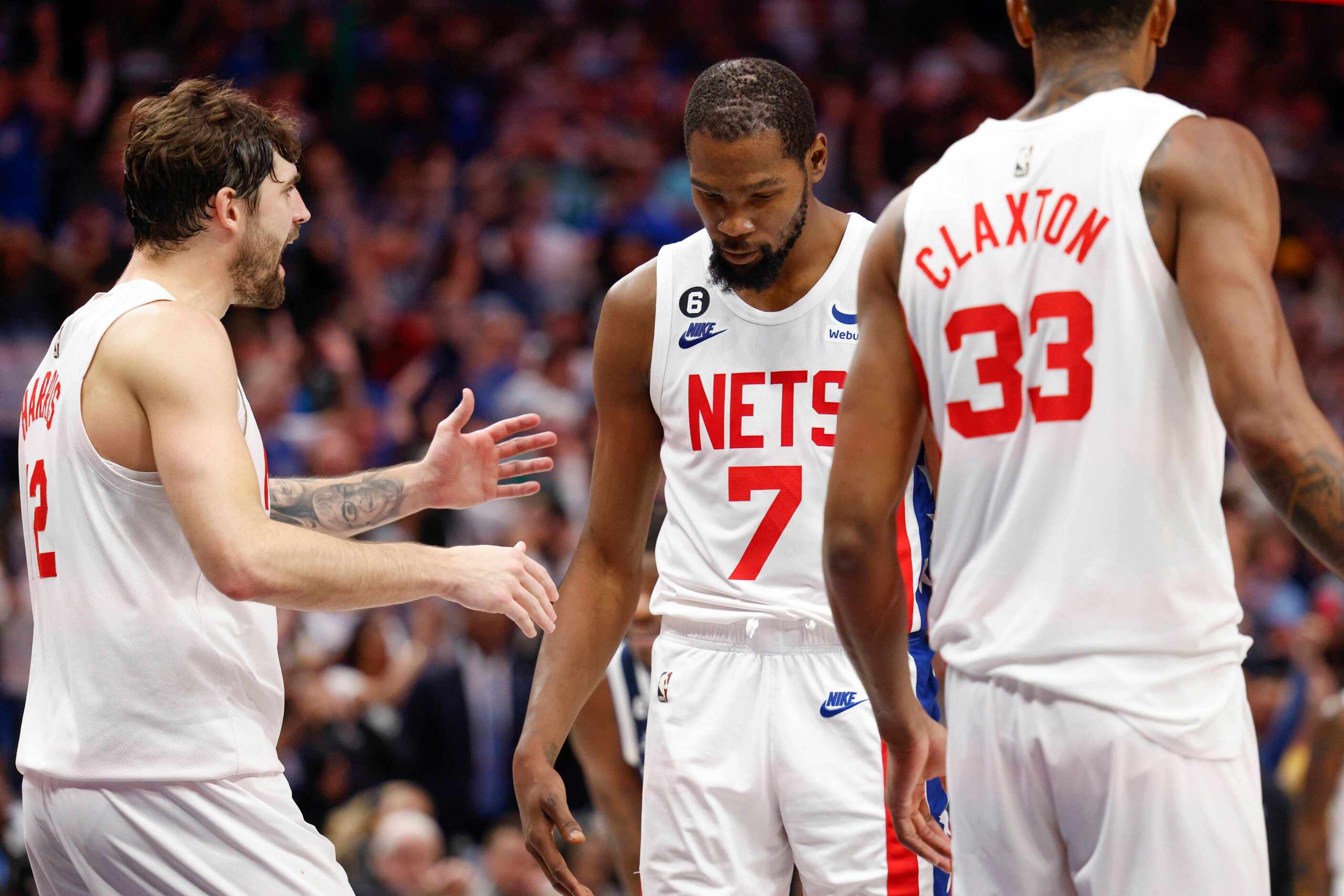 Brooklyn Nets forward Kevin Durant (7) reacts after missing his second of three foul shots...