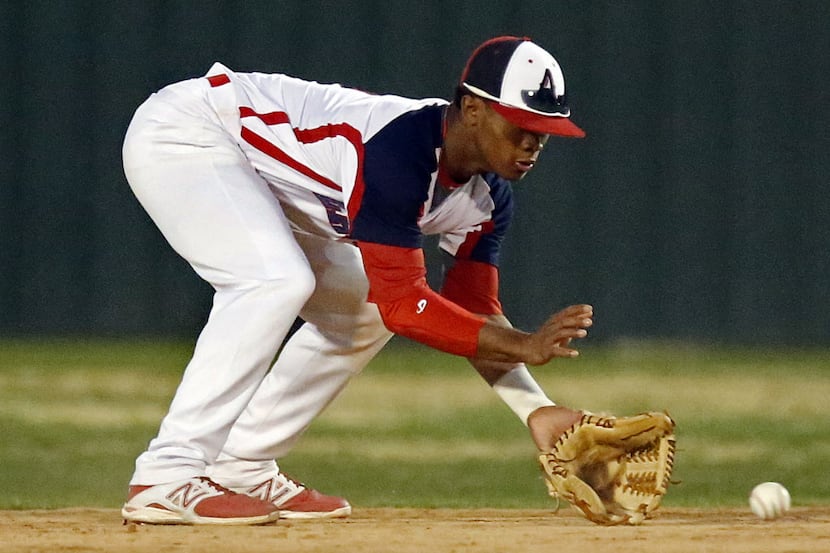 Allen High School second baseman Kyler Murray (7) fields a grounder before making the throw...