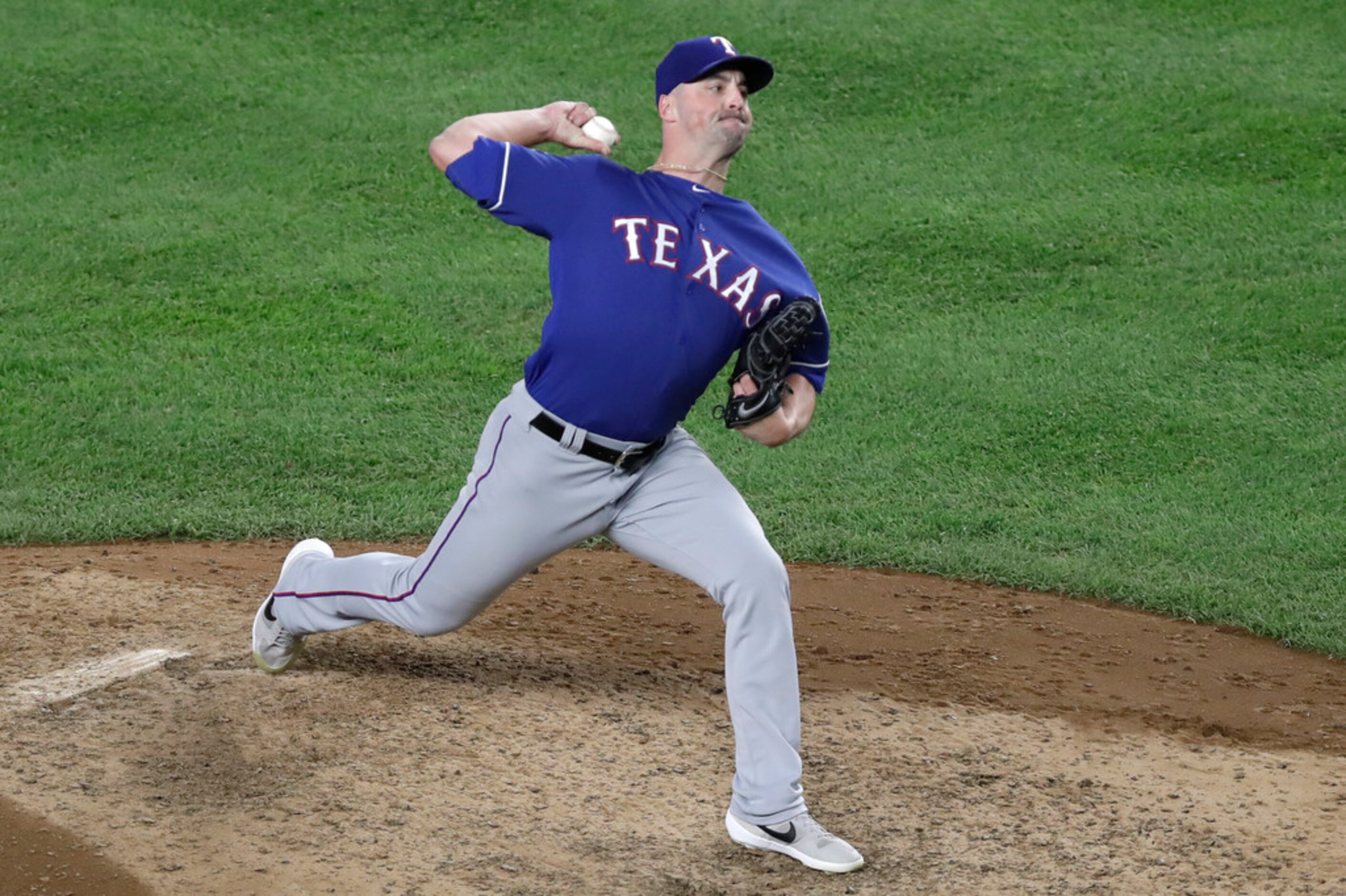 Texas Rangers relief pitcher Taylor Guerrieri throws to a New York Yankees batter Wednesday,...