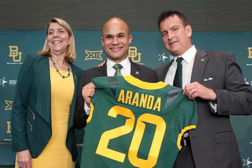 Baylor University Dr. Linda A. Livingstone, left, and Athletic Director Mack Rhoades, right,...