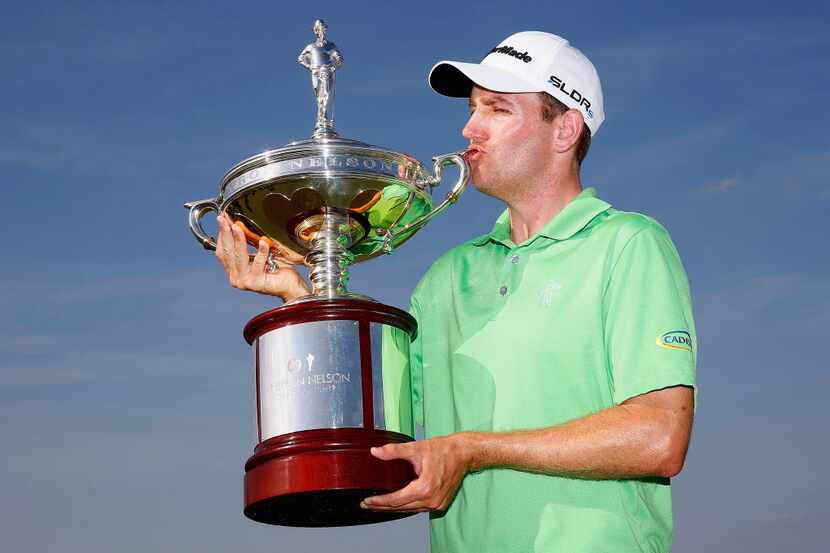 IRVING, TX - MAY 18:  Brendon Todd kisses the trophy after his victory at the HP Byron...