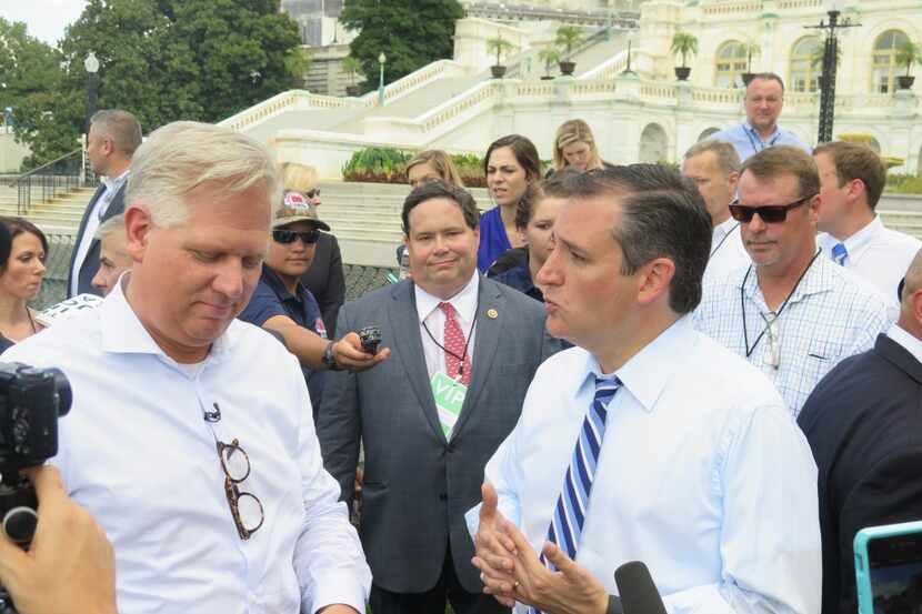  Sen. Ted Cruz speaks with conservative Glenn Beck during the anti-Iran deal rally at the...