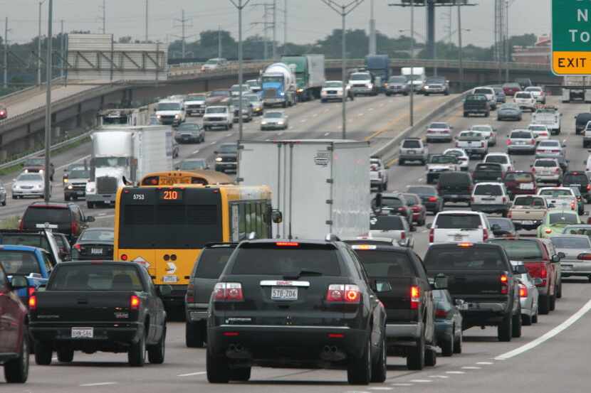  Northbound morning rush hour traffic moves slowly along I-35 Thursday morning just north of...