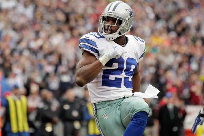 FILE - In this Dec. 28, 2014, file photo, Dallas Cowboys running back DeMarco Murray (29)...