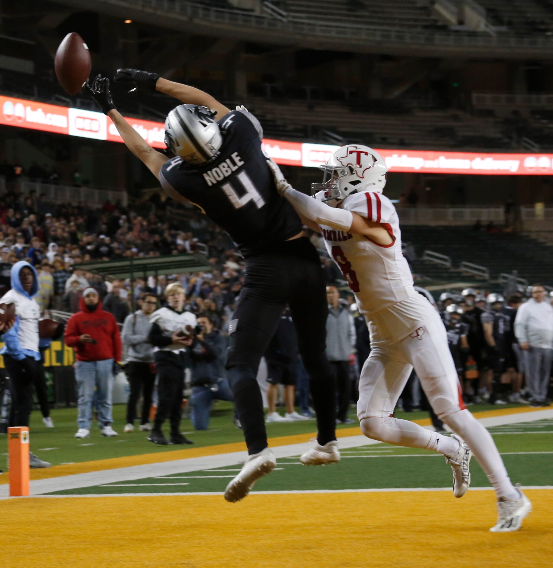 Denton Guyer receiver Brody Noble (4) is unable to pull in a pass in the end zone as he is...